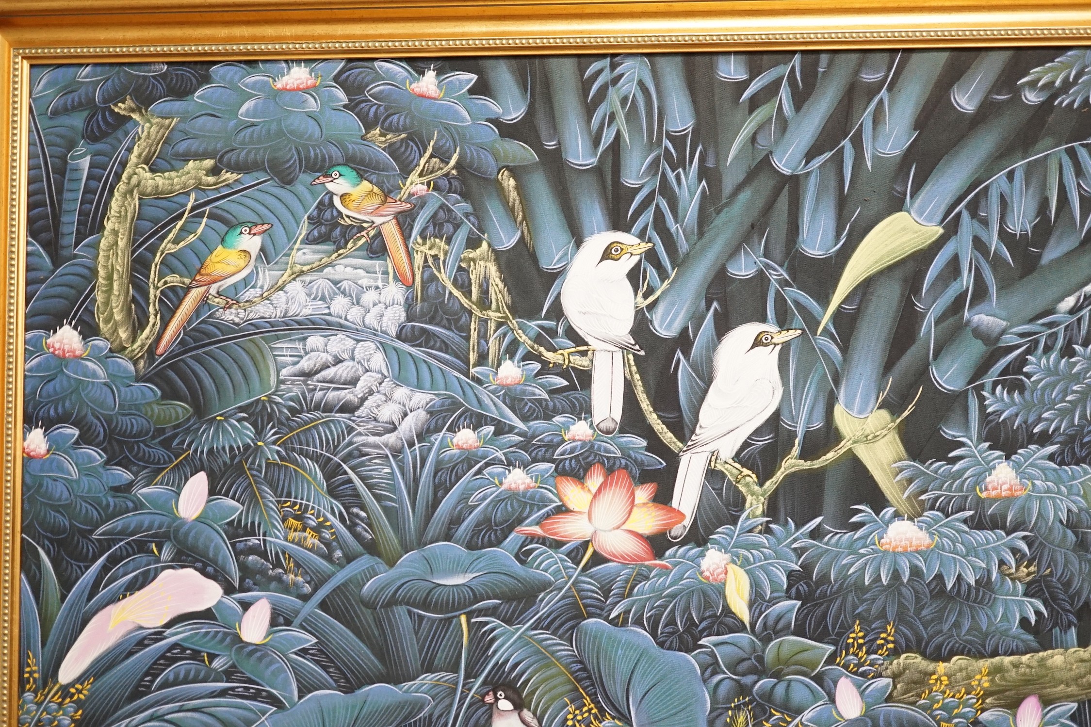 A modern Batik painting of birds amongst trees and flowers, 82 x 131cm